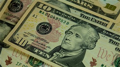 خفض مجلس الاحتياطي الفيدرالي الفائدة مجددًا بمقدار 25 نقطة أساس مما يمهّد لمرحلة تيسير نقدي عالمي في 2026